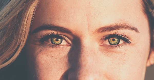 Close-up of a woman’s eyes representing self-awareness and reflection